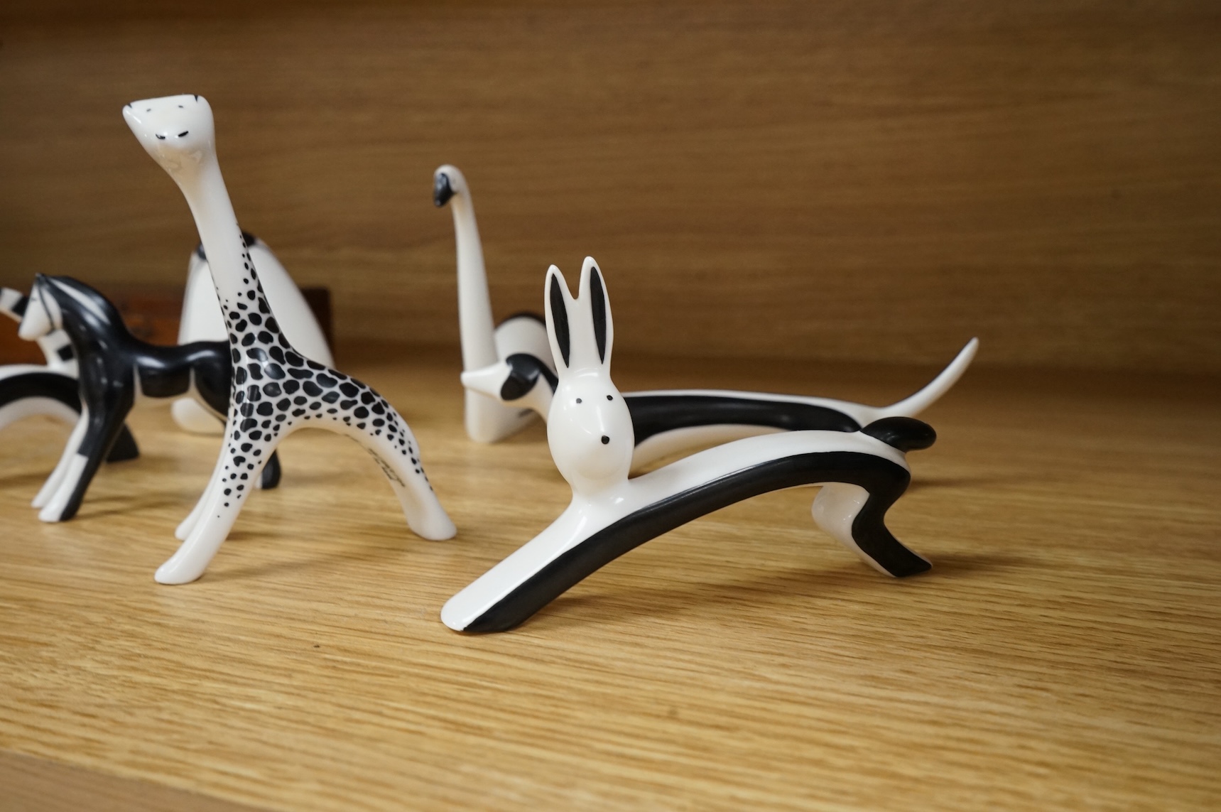 A collection of mid century Cmielow ceramic animals to include cat, rabbit and swan, largest 18cm in length